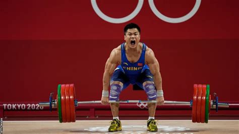 Lyu Xiaojun: Weightlifting Olympic champion provisionally .